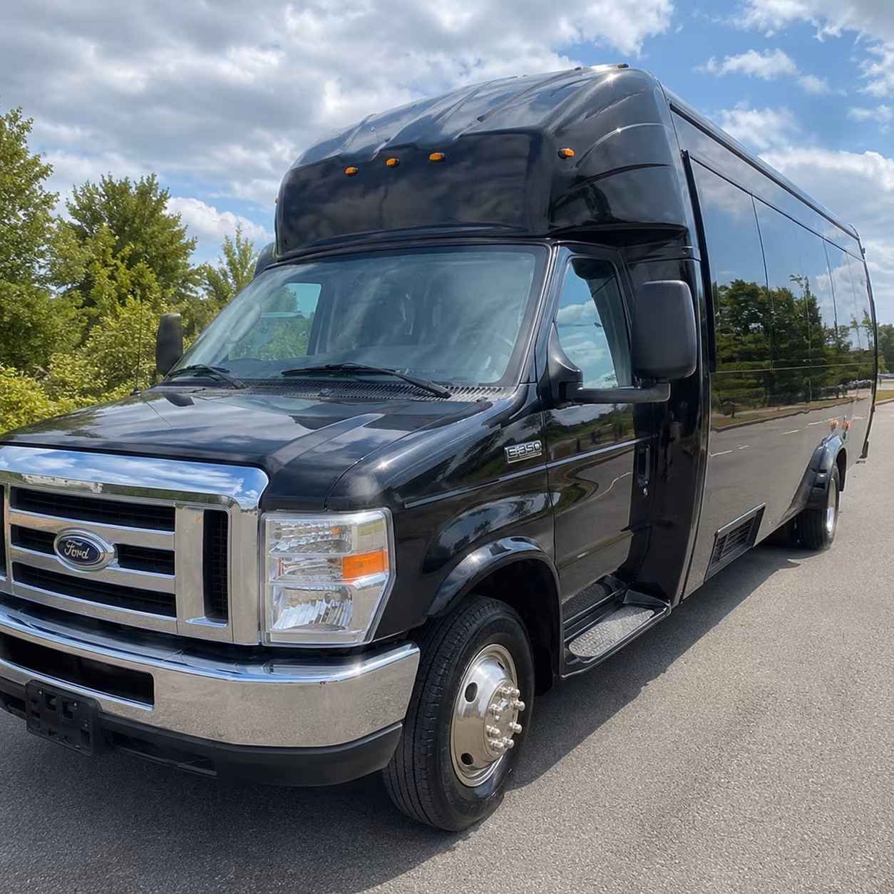 Columbus Birthday, Sweet 16, & Quinceañera Transportation party bus exterior
